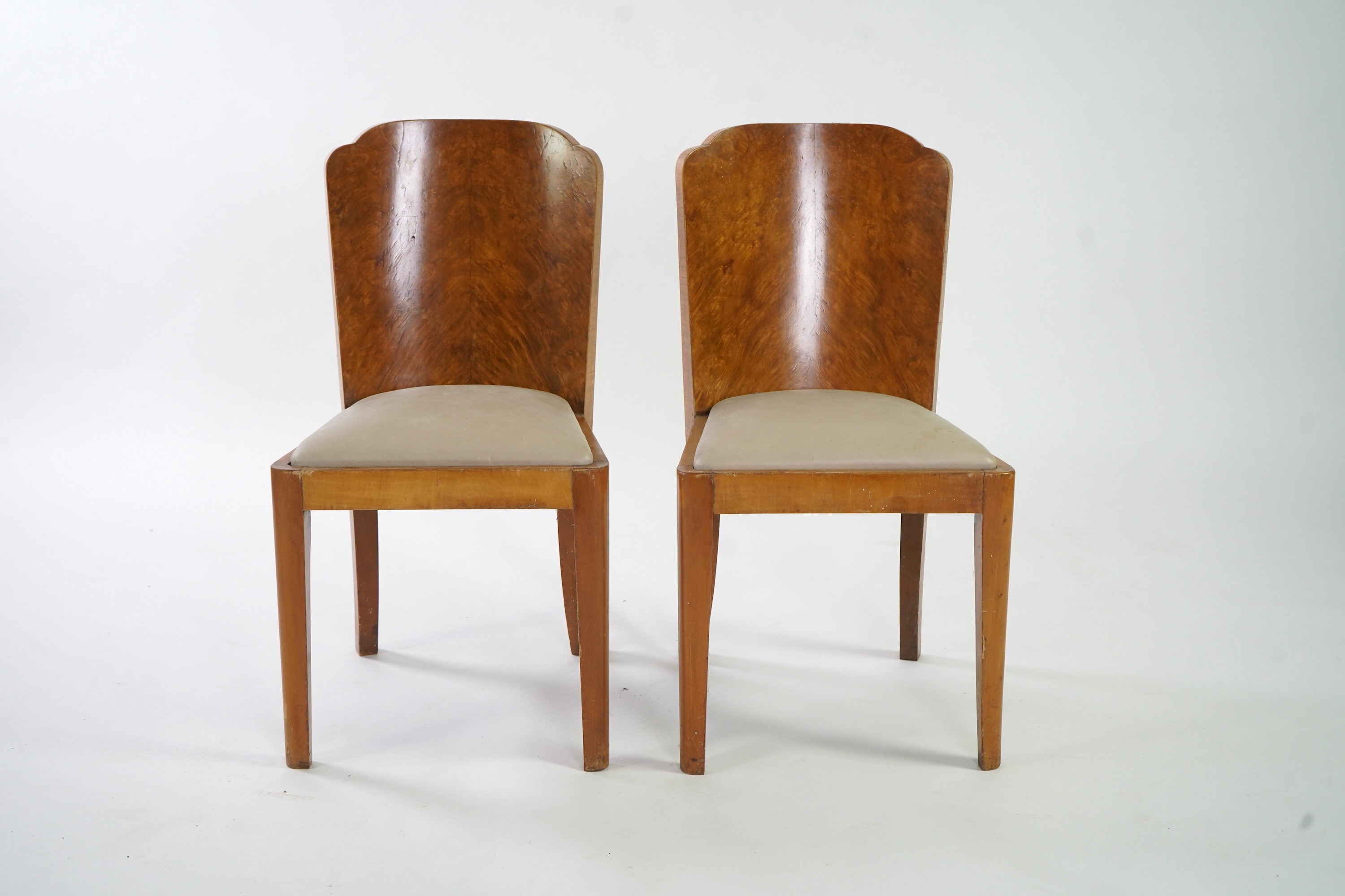 Attributed to Harry and Lou Epstein: An Art Deco burr walnut dining suite